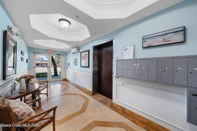 corridor featuring a wall mounted air conditioner, light tile flooring, a raised ceiling, crown molding, and elevator