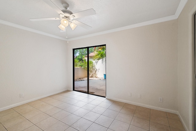 tiled spare room with ceiling fan and ornamental molding