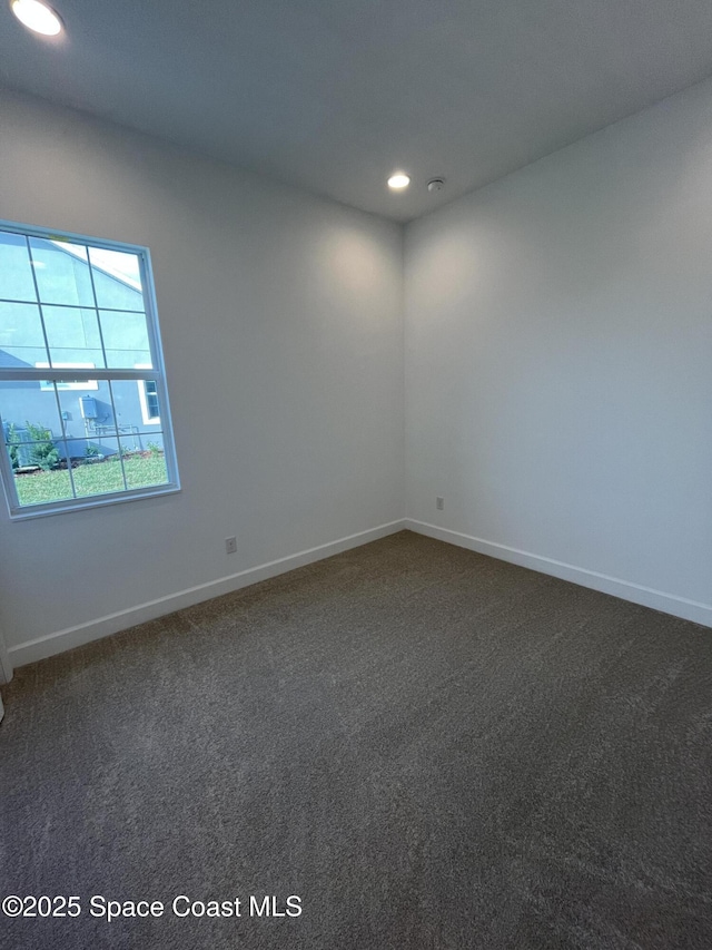 view of carpeted spare room