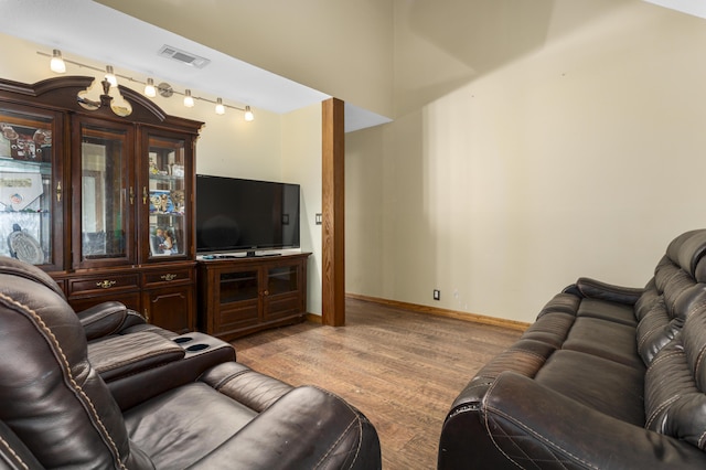 living room with light hardwood / wood-style flooring