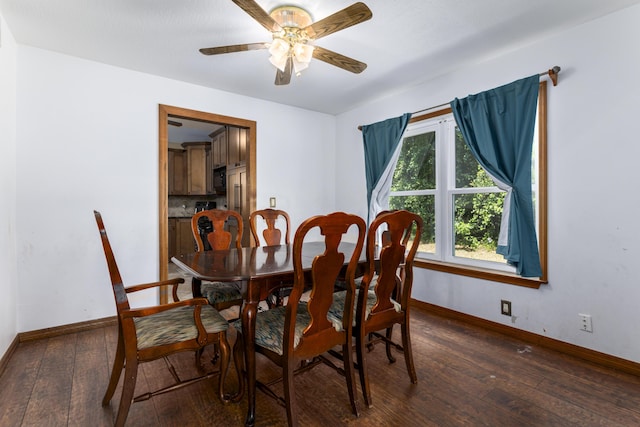 dining area featuring ceiling fan, a healthy amount of sunlight, and dark hardwood / wood-style flooring