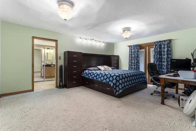 bedroom with a textured ceiling and ceiling fan