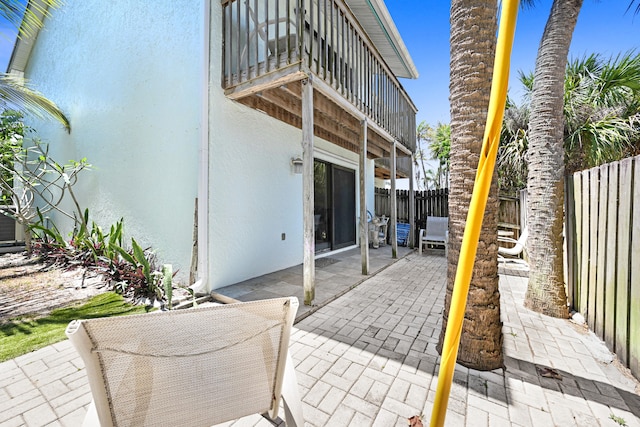 view of patio with a balcony