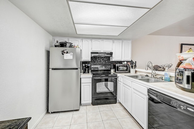 kitchen with white cabinetry, black appliances, sink, tasteful backsplash, and light tile flooring