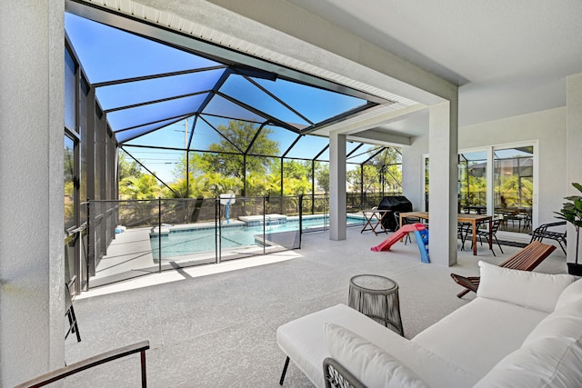 view of pool featuring grilling area