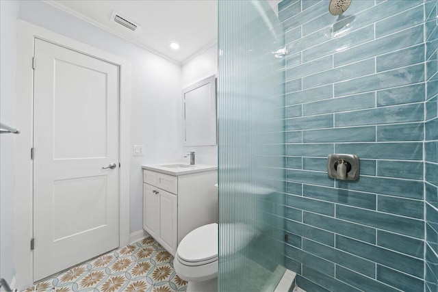 bathroom featuring toilet, a shower, crown molding, and vanity