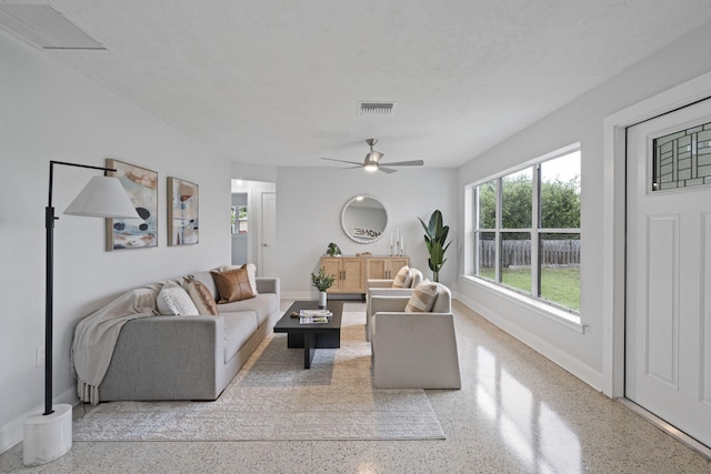 living room with ceiling fan