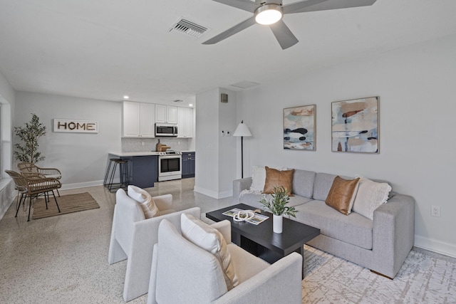 living room with ceiling fan