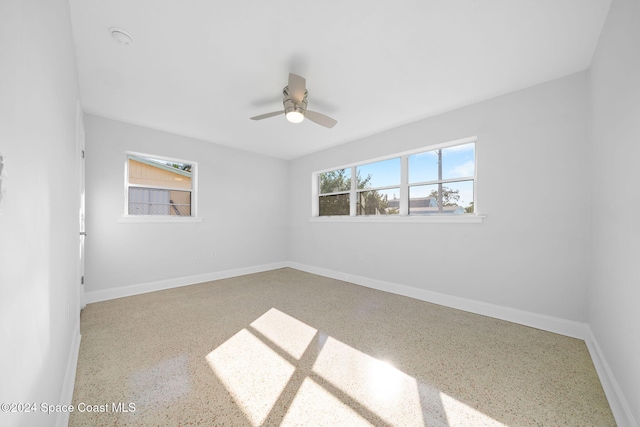 empty room featuring ceiling fan