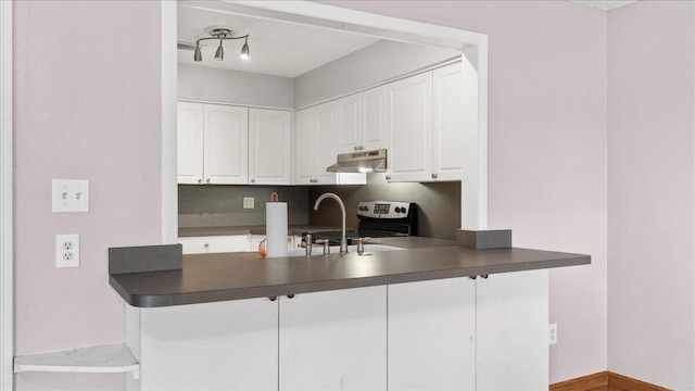 kitchen featuring sink, white cabinets, and stainless steel range with electric stovetop