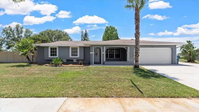 single story home with a front yard and a garage