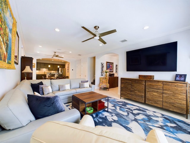 living room featuring ceiling fan