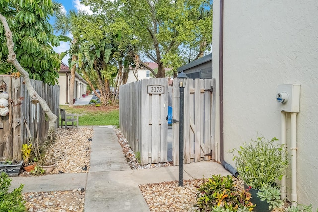 3173 Beach Winds Ct, Melbourne Beach, FL 32951 - view of yard with a gate