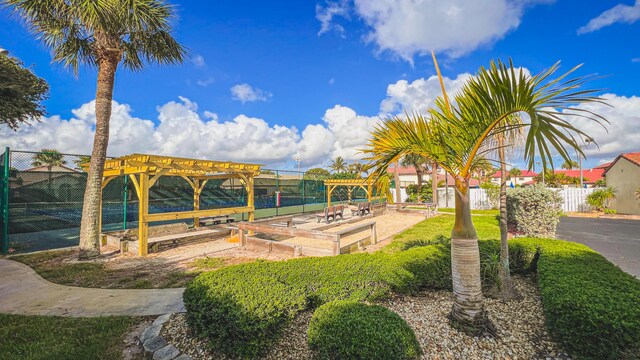 3173 Beach Winds Ct, Melbourne Beach, FL 32951 - view of community featuring a pergola