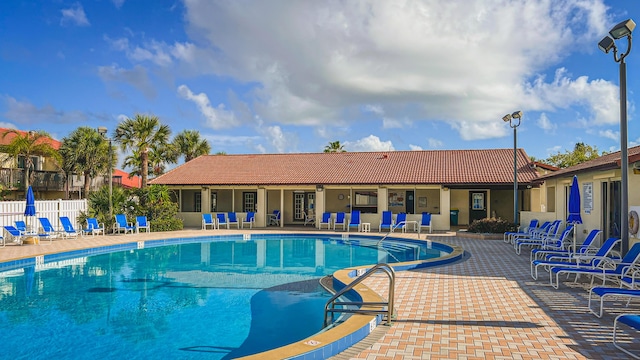 3173 Beach Winds Ct, Melbourne Beach, FL 32951 - community pool with a patio