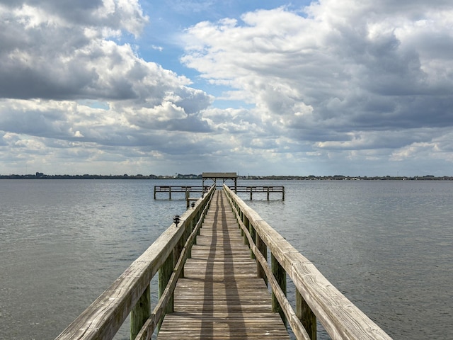 3173 Beach Winds Ct, Melbourne Beach, FL 32951 - dock featuring a water view