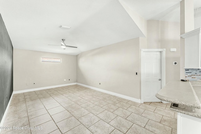 spare room featuring ceiling fan