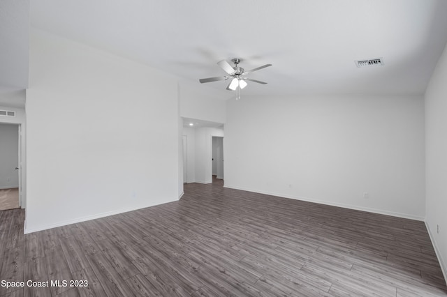 spare room with hardwood / wood-style floors and ceiling fan