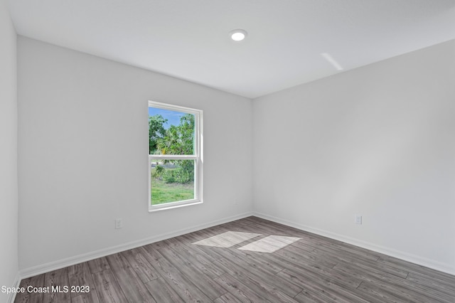 empty room featuring hardwood / wood-style floors