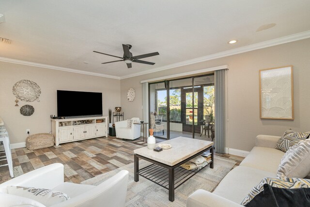 living room featuring ceiling fan, light hardwood / wood-style flooring, and ornamental molding