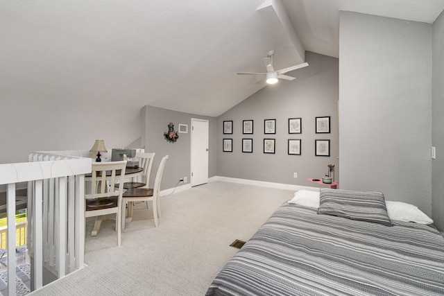 bedroom featuring carpet, ceiling fan, and lofted ceiling