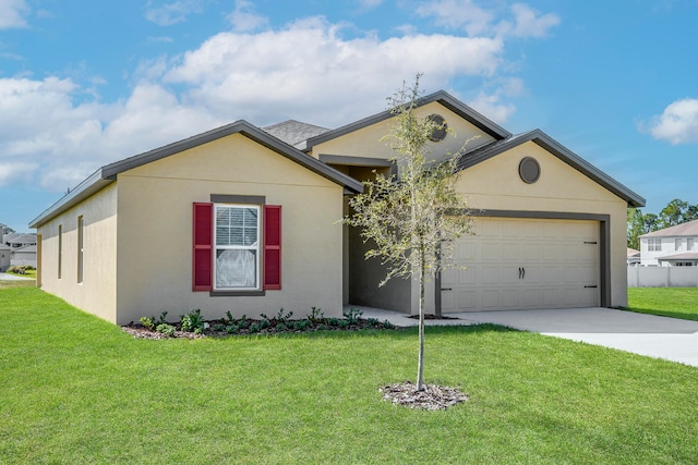 ranch-style home featuring a garage and a front lawn