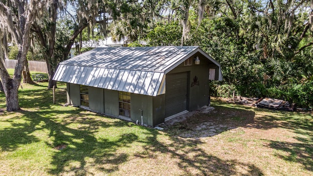 view of shed / structure with a lawn