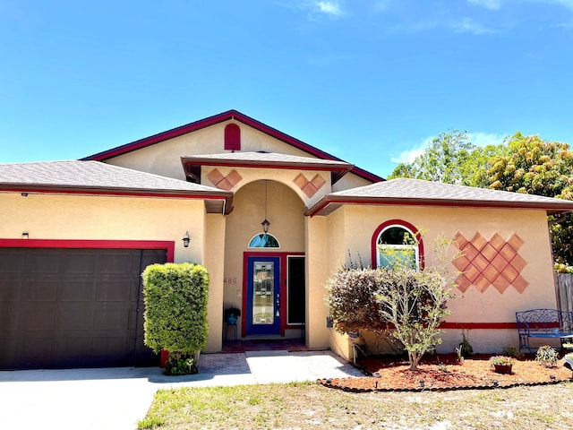 view of front of property with a garage