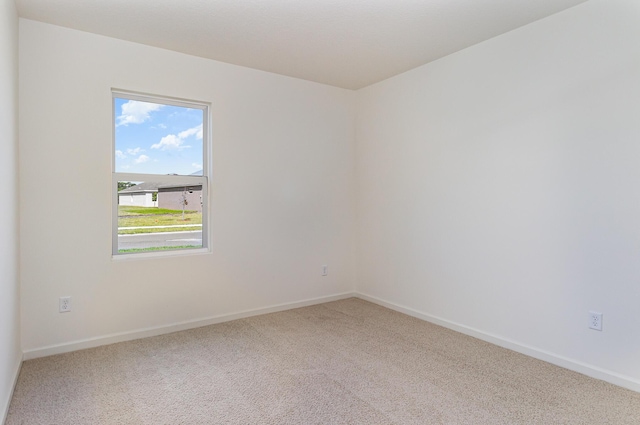 spare room with carpet flooring