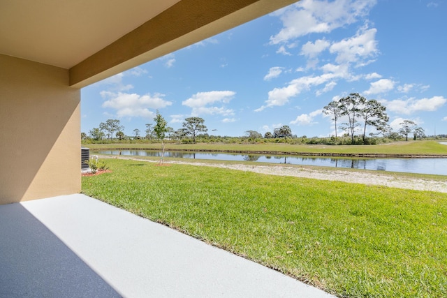 view of yard with a water view