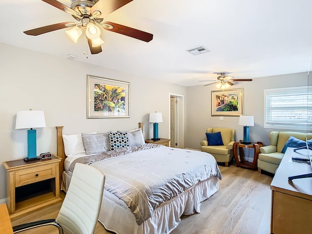 280 Monroe Ave, Cape Canaveral, FL 32920 - bedroom featuring light wood finished floors and a ceiling fan