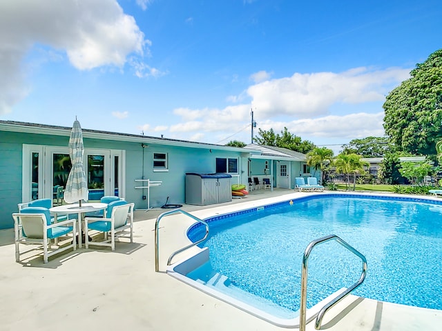 280 Monroe Ave, Cape Canaveral, FL 32920 - outdoor pool featuring a patio area and outdoor dining space