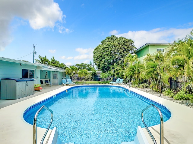 280 Monroe Ave, Cape Canaveral, FL 32920 - swimming pool featuring a patio area