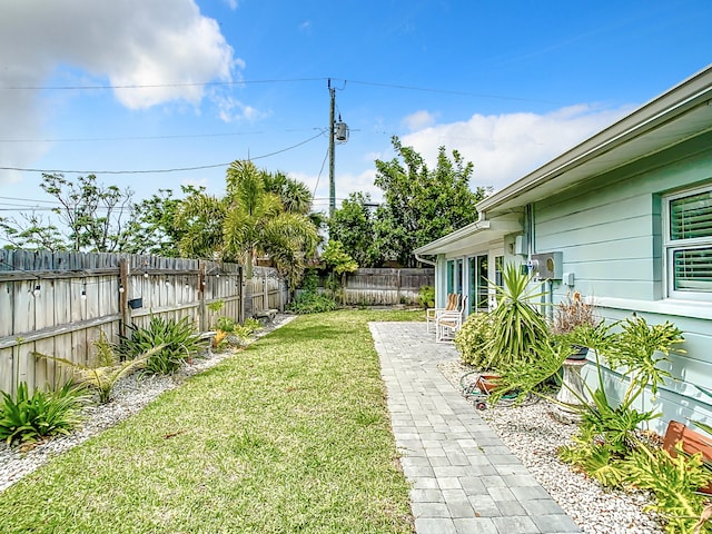 280 Monroe Ave, Cape Canaveral, FL 32920 - view of yard featuring a patio