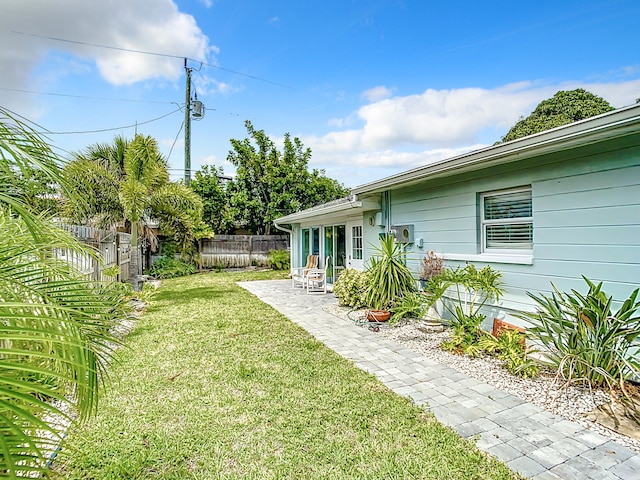 280 Monroe Ave, Cape Canaveral, FL 32920 - view of yard featuring a patio