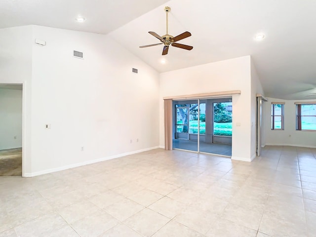 unfurnished room with high vaulted ceiling and ceiling fan