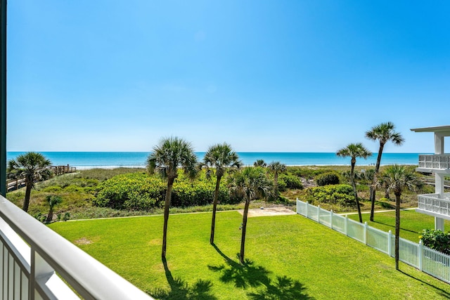 exterior space featuring a water view and a yard