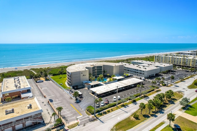 aerial view featuring a beach view and a water view