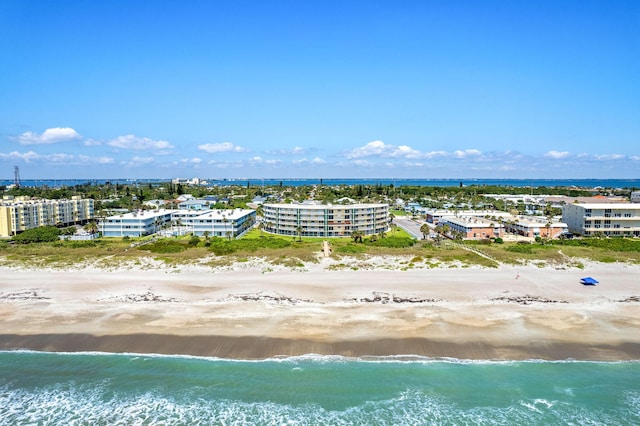 bird's eye view with a view of the beach and a water view