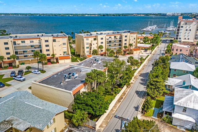 drone / aerial view with a water view