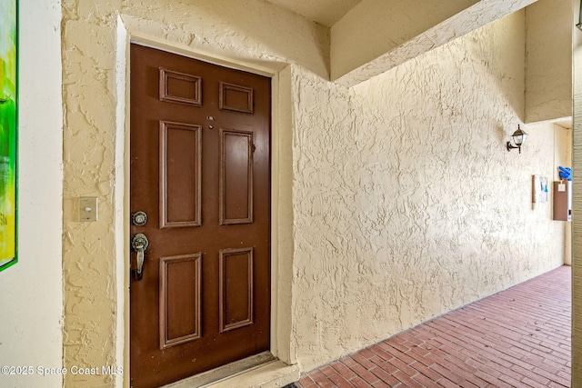115 N Indian River Dr Unit 133, Cocoa, FL 32922 - property entrance featuring stucco siding