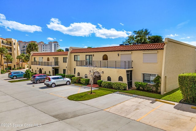 115 N Indian River Dr Unit 133, Cocoa, FL 32922 - view of property with uncovered parking