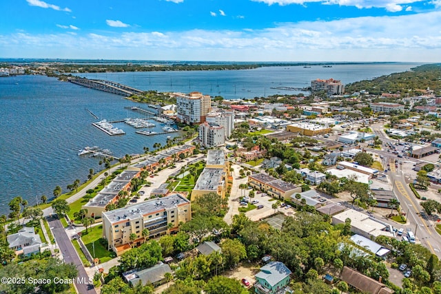 115 N Indian River Dr Unit 133, Cocoa, FL 32922 - aerial view of property and surrounding area featuring a nearby body of water and a notable bridge