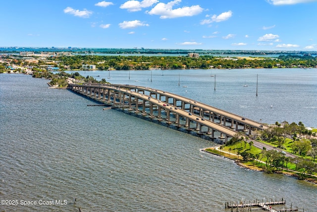 115 N Indian River Dr Unit 133, Cocoa, FL 32922 - drone / aerial view of a notable bridge, a large body of water, and a pier