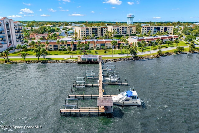 115 N Indian River Dr Unit 133, Cocoa, FL 32922 - drone / aerial view of a large body of water and apartment complex