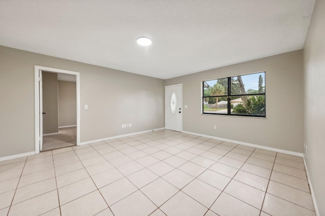 view of tiled spare room