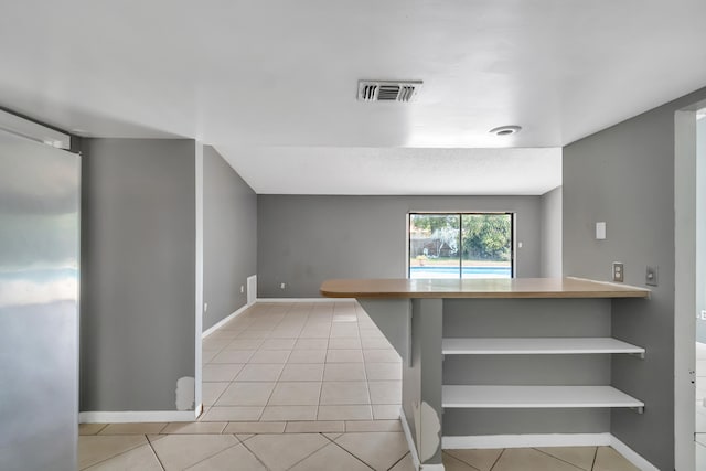 view of tiled empty room