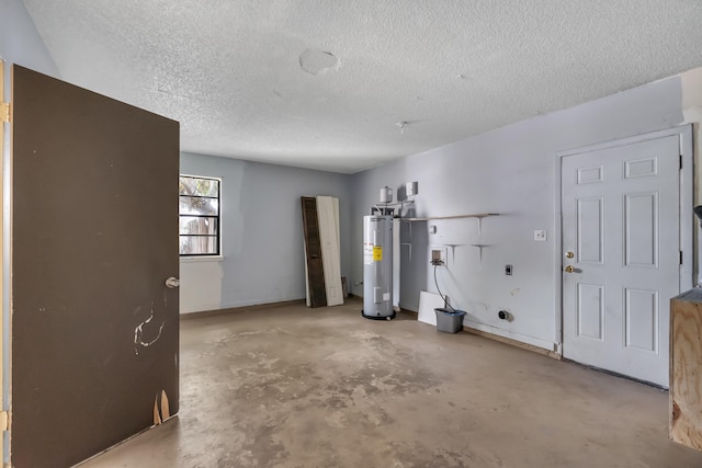 garage featuring electric water heater