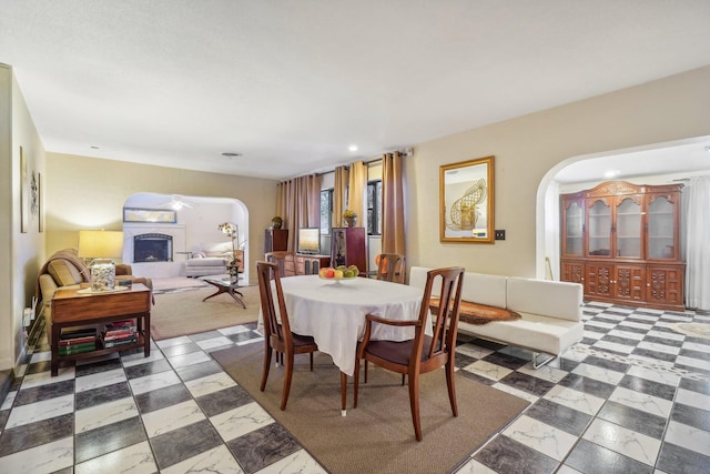 dining space featuring tile floors