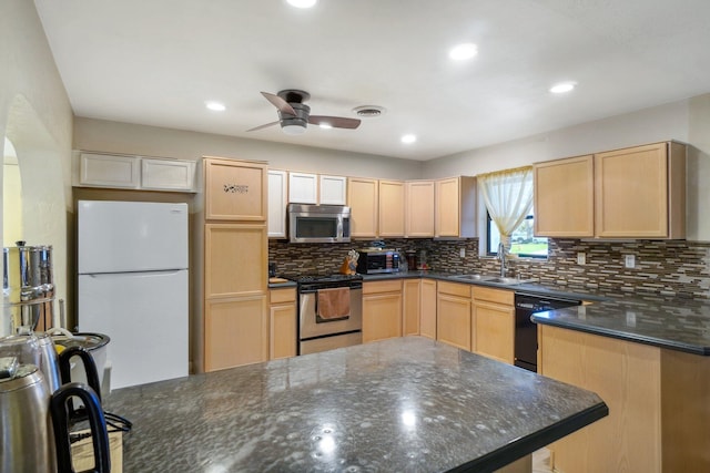 kitchen featuring light brown cabinets, ceiling fan, stainless steel appliances, and backsplash